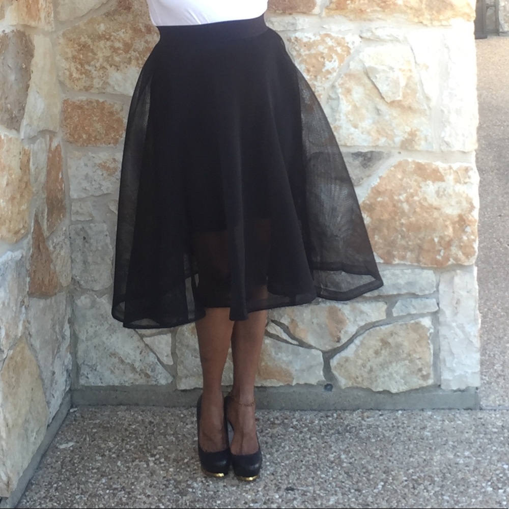 Black mesh knee length skirt